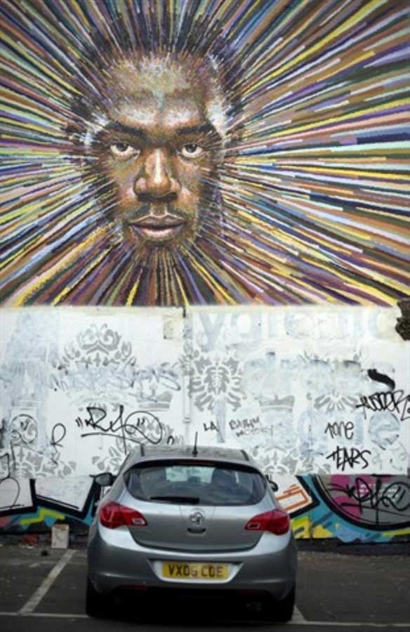 Dưới đây là một tác phẩm nghệ thuật được vẽ bởi họa sĩ đường phố Jimmy C. Tác phẩm thể hiện gương mặt của VĐV điền kinh nổi tiếng người Jamaica, Usain Bolt, trên tường ở một con phố Đông London.